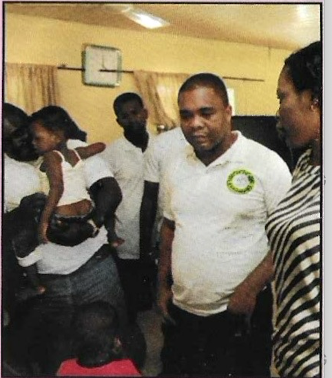 Volunteers spending time with the children of the home
