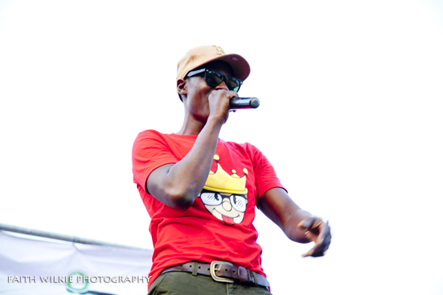 Artiste in red t-shirt performing